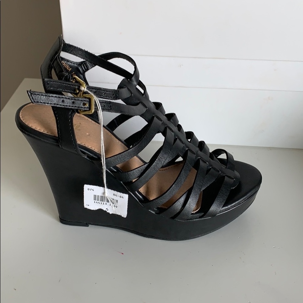 Brand new Wedges . Size 6